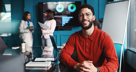 Aufkleber - Finance, meeting and portrait of businessman in office for company investment risk management plan. Happy, team and male data scientist with trading volumes for stock market report in workplace.