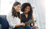 © peopleimages.com - Teamwork, discussion and business women on tablet for brainstorming ideas in startup. Technology, collaboration or happy workers in creative meeting for content writing, planning story and research
