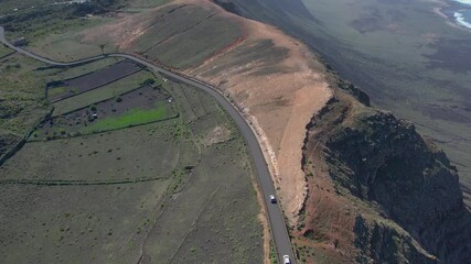 Wall Mural - Aerial drone view of mountain sea and volcanoes in Lanzarote, Canary Islands, Spain