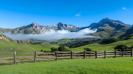 Wall Mural - Scenic View of Rolling Green Hills with a Rustic Fence and Clear Blue Sky