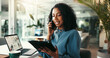 © peopleimages.com - Business woman, designer and phone call with tablet for online communication or tech support at office. Female person, employee or consultant talking on mobile smartphone with technology at workplace