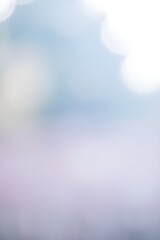 Wall Mural - Background image, Soft, blurred lights create a calming and ethereal atmosphere, with gentle hues of blue and white. The bokeh effect evokes a dreamy and serene mood.