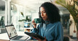 © peopleimages.com - Morning, coffee and woman with tablet, office and creative for article in newsroom, research or online. Digital, reporter and proofreading of story in business, relax and calm for project or drinking