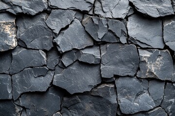 Poster - Black rock wall texture on a solid black background for use in design and artistic projects