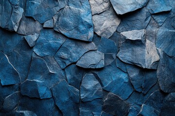 Poster - Blue textured wall with an arrangement of various rocks in natural setting
