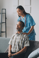 Wall Mural - Female Physical Therapist Examines the Patient's Neck