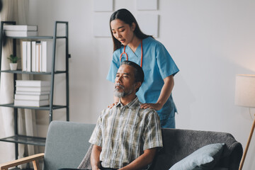 Wall Mural - Female Physical Therapist Examines the Patient's Neck