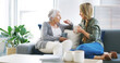 © BuyoutReese09/peopleimages.com - Elderly mother, woman and relax with coffee for conversation, gossip story and weekend visit in home. Senior person, daughter or tea time in living room sofa for bonding, love or healthy relationship