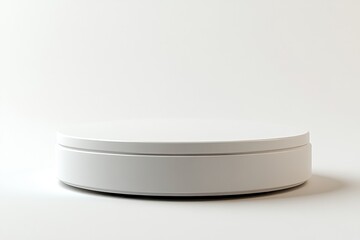 Poster - Modern white table with a black base in a bright room setting