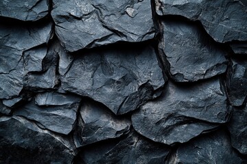 Poster - Black rock wall texture on a solid black background for design and artistic purposes