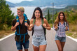 © NDABCREATIVITY - Multiracial best friends having fun outside. Happy friends on road trip have fun at summer vacation