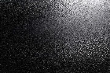 Poster - dark textured surface: a dramatic close-up revealing the rich, deep texture of a dark surface. the s