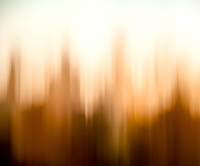 Poster - abstract sunset: golden hues: an abstract image capturing the essence of a sunset, with blurred vert