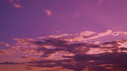 Wall Mural - Amazing Color Effect Of Cloud Timelapse. Natural Bright Dramatic Sky Background. Soft Colors. Pink Clouds Time-lapse. Fantasy Clouds Time Lapse. Gently Pink, Red Colors. Dusk Sunset Time