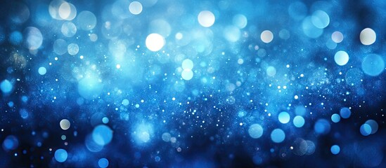 Leinwandbilder - Festive blue background with varying shades of blue and sparkling light bokeh creates a joyful atmosphere ideal for celebrations and events