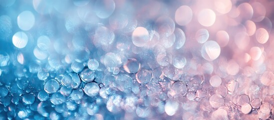 Leinwandbilder - Defocused bokeh background with pink and blue hues featuring circular light reflections and droplets, horizontal layout with ample copy space.