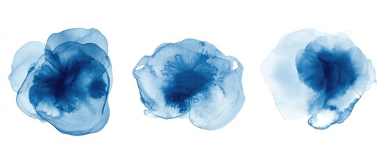 Aufkleber - Set of three light blue ink spots arranged artistically on a clean white background highlighting their unique textures and fluid shapes