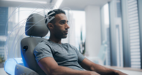 Wall Mural - Futuristic Laboratory: Male Patient Wearing Headset for an Advanced Brain Scan Using Advanced Neural Technology. Medical Sci Fi Device Concept: Disease Treatment, Sleep, Mental Agility, IQ Growth