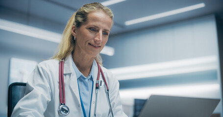 Aufkleber - Portrait of a Female Physician Working on a Laptop Computer in a High-tech Hospital Office, Focusing on Medical Research and Patient Data Analysis in a Modern Clinical Setting