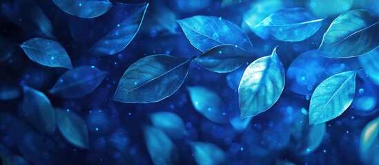 Leinwandbilder - Vibrant blue abstract background featuring translucent leaves with soft lighting effects, creating an enchanting and tranquil atmosphere.