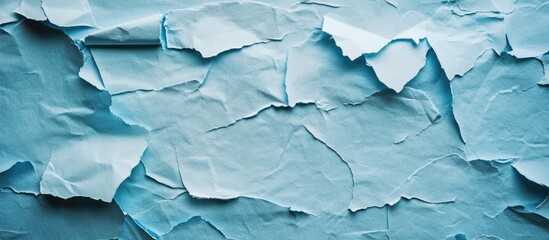 Poster - Textured light blue wallpaper with crumpled paper effect featuring subtle shades and creases for versatile creative applications and design projects