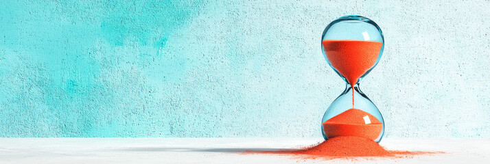 Poster - A creative digital artwork showcasing an hourglass against a textured background, with vibrant sand trickling through to represent the urgency of passing moments,
