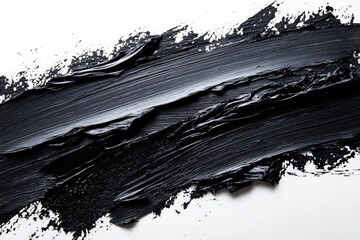 Aufkleber - Layers of deep black paint spread across a canvas create an abstract texture in an artistic composition