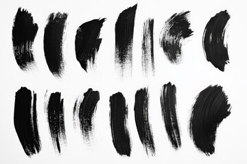 Aufkleber - Black paint strokes arranged in various patterns on a white background showcasing artistic techniques and textures