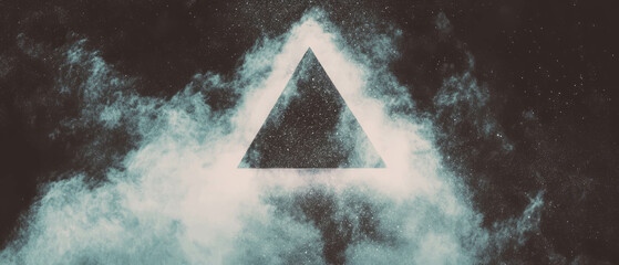 Poster - Angular triangular dust forms create geometric patterns against a black background