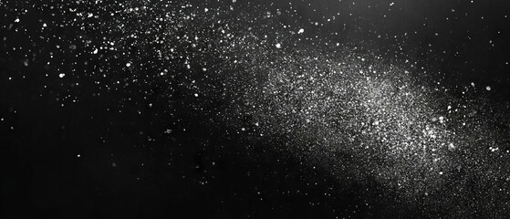 Poster - Glittering particles create a mesmerizing effect against a dark background