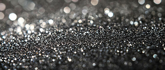 Poster - Captivating silver glitter overlay creating a festive atmosphere on a black background