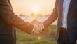 © Worldwide - Business Agreement at Sunset with Solar Panels in Background