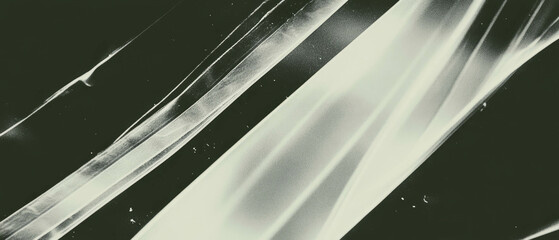 Poster - partially transparent film layers creating depth on a black background