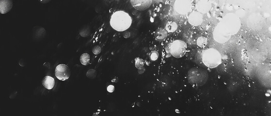 Poster - Overlay texture of water bubbles reflecting light against a dark background