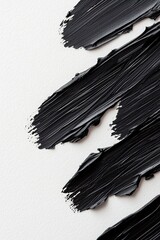 Poster - Soft black brushstrokes elegantly flow across a clean white surface, creating a tranquil atmosphere suited for wellness themes or artistic presentations