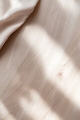 Poster - Soft, diffused warm light enhances the smooth light oak wood texture, transitioning into a clean beige background. This creates a calm, inviting atmosphere with ample space for text
