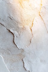 Poster - A textured concrete or light stone surface is gently illuminated by soft golden light at the top corner, blending into a neutral gradient background for a contemporary feel