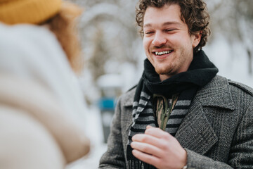 Poster - A candid photograph of two friends sharing laughs and smiles set against a snow-covered background, embodying joy and camaraderie on a winter day.