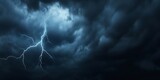 Lightning bolts are illuminating a dramatic stormy sky full of dark clouds, creating a powerful and intense atmosphere