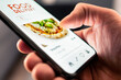 © terovesalainen - Food and pizza delivery with phone from restaurant. Online app order. Take away menu on website. Quick takeout service. Deliver home fast. Smartphone application in screen.