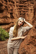 © sv.kurapova - Hiker girl in the Canyon Kok-Moinok in Kyrgyzstan. Travel, freedom, lifestyle concept.