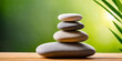 © Naluphon - Stacked Stones and Green Leaves - Zen Garden Concept