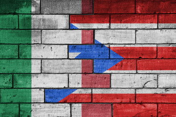 Canvas Print - colourful painted big flag of italy and flag of puerto rico on a massive old brick wall background. concept