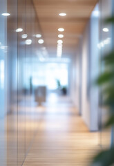 Wall Mural - Modern office hallway with shiny floor and large windows blurred office interior background with a blurry modern white and glass business space
