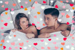 © deagreez - Who are you Top view of funny man and woman lying in bed covered by sheets with wide opened eyes looking at each other, having shock, confuse