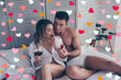 © deagreez - Will you merry me Muscular man giving engagement ring in red box to his shocked, amazed lover, lady hold cup of wine, sitting on linens, future husband, wife celebrating valentine day, 14 february
