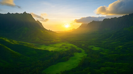 Wall Mural - Beautiful sunrise over lush green valleys and distant mountain ranges.