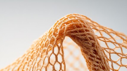 close up of an orange string bag mesh