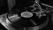 © Kitta Studio - Vintage Vinyl Record on Turntable in Black and White Setting