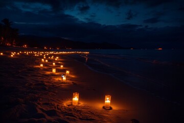 Wall Mural - Candles illuminating a tranquil beach at twilight creating a serene atmosphere